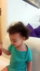 Very little girl singing song