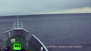Tsunami Climbing_ Incredible video of ship heading into wave in Japan