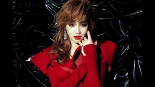 Lee Yoo Ri is a black vixen with bright red lips for Vogue Magazine