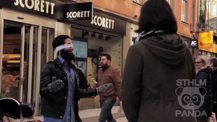 Muslim man blindfolds himself and asks strangers in Paris to hug him