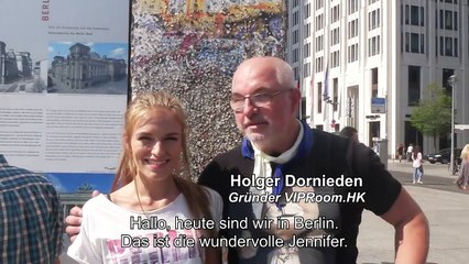 Model with painted jeans walk trough Berlin Reichstag Building