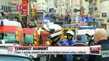 Police continue raids in Brussels, countries tighten security