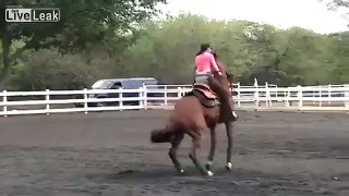 LiveLeak Woman Takes On Bucking Horse Like A Champ
