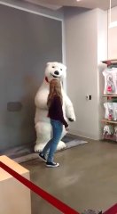 This man loves his job as a Coca-Cola Mascot