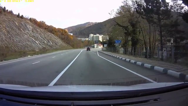 A dashcam records a tire coming off an SUV and knocking out a really unlucky guy.