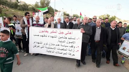 Palestinians protest in Jerusalem, call for return of bodies