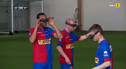 Soccer players play using birds-eye glasses