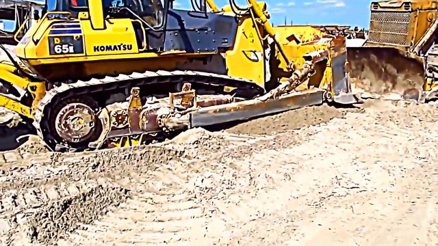 the biggest bulldozer in the world,amazing bulldozer stuck in mud,bulldozer working