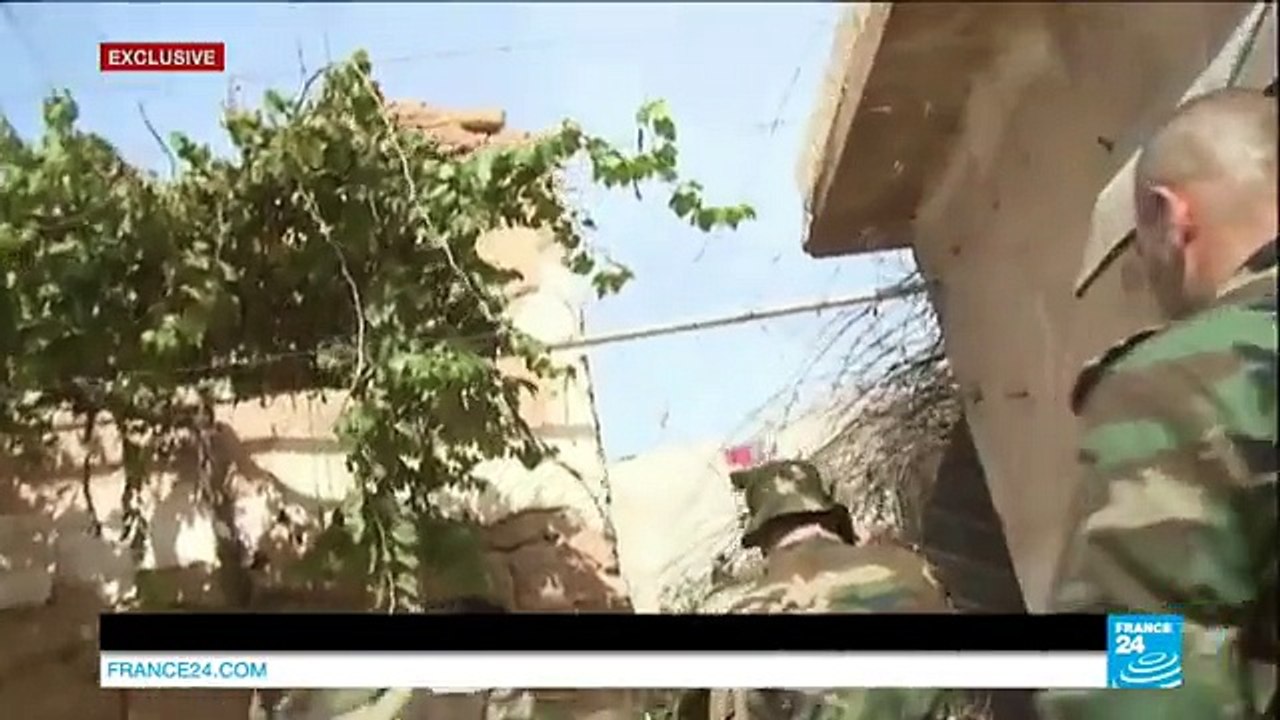 EXCLUSIVE - Report alongside Russian soldiers in Syria