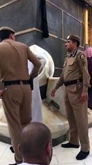 This beautiful video shows the black stone being cleaned... Amazing!