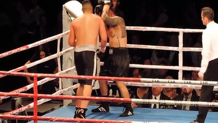 As blood splatters on the camera, Willis Meehan instructing the ref to do his job