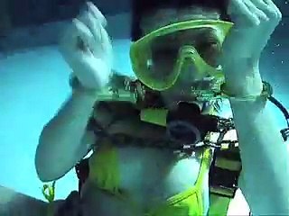 Asian girl tutorial on scuba dive