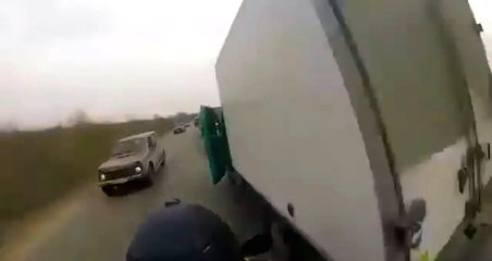 Motorcyclist Tries To Skip Traffic and Pays For It