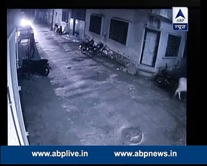 CCTV captures a car trying to crush a man against the wall