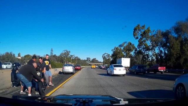Good Samaritans Stop After Motorcycle Loses Control And Crashes On Highway