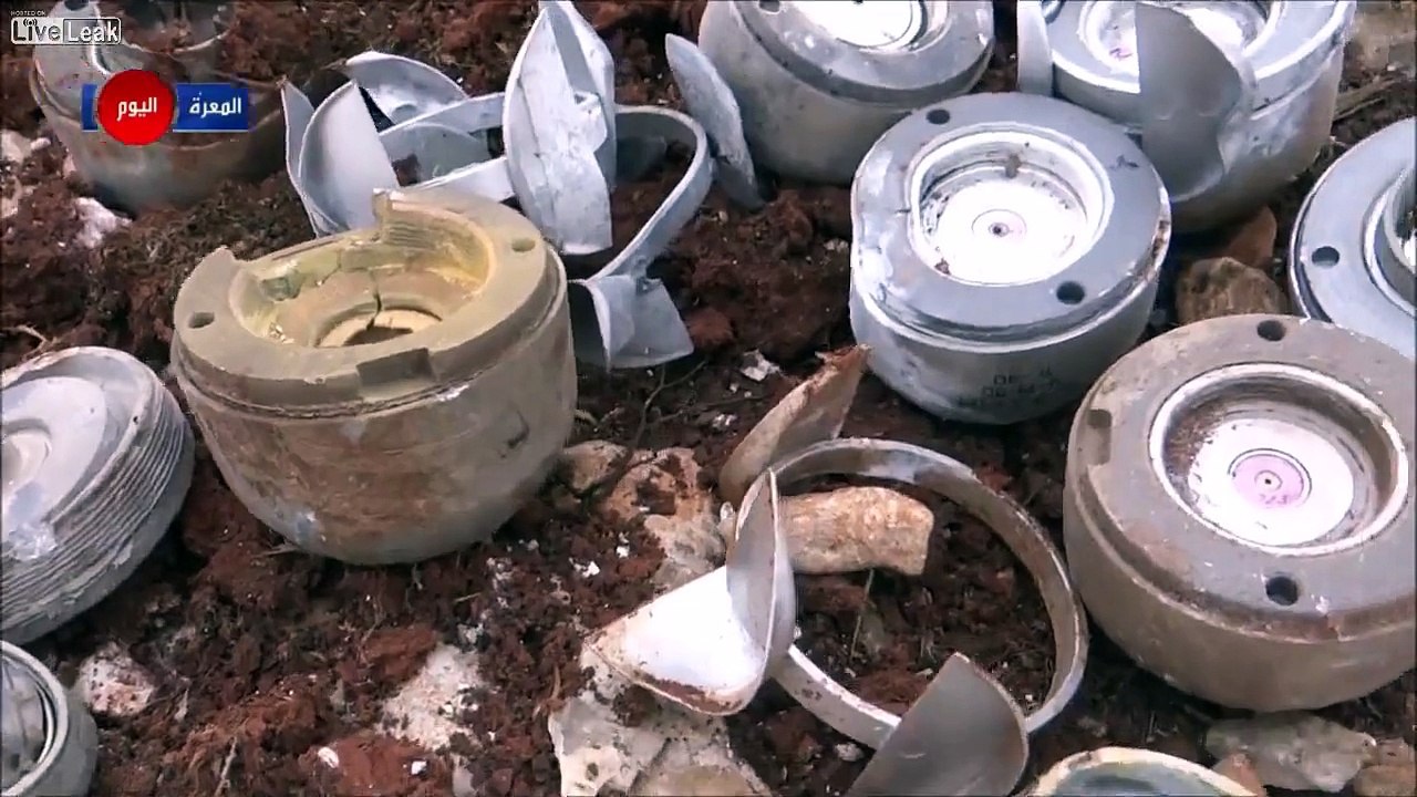 A citizen records unexploded russian submunitions and the body of an OTR 21 ballistic rock