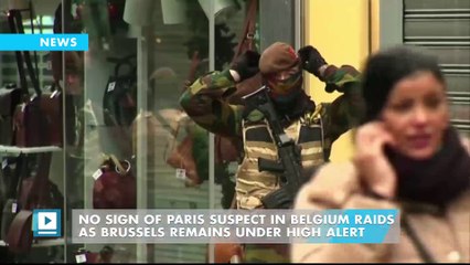 No sign of Paris suspect in Belgium raids as Brussels remains under high alert