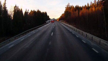 Lorry hangs off edge of bridge after crash