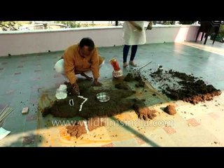 Hindus build cow dung hillock to symbolize Mount Govardhan