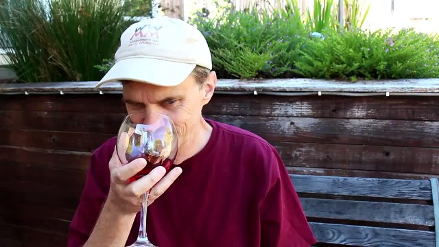 Wall-mounted wine rack made from recycled wood