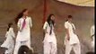 Pakistani college girls dancing on stage in front of staff