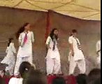 Pakistani college girls dancing on stage in front of staff