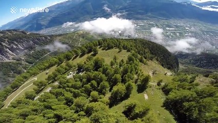 Amazing POV wingsuit flight in Switzerland