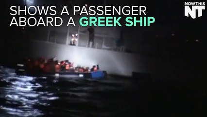 Скачать видео: Passenger On A Greek Ship Tries To Deflate A Rubber Boat Carrying Refugees