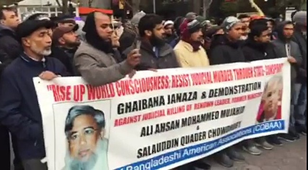 মুজাহিদ ও সা. কাদেরকে খুনের প্রতিবাদের জাতিসংঘের সামনে বক্তব্য দিচ্ছেন আবু সামিহা সিরাজ