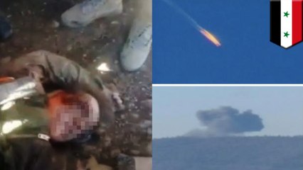 Download Video: Russian pilots shot at by Syrian rebels as they parachuted to the ground