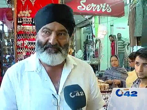 Sikh Yatri shopping at Liberty market Lahore
