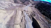 Landslide causes road to buckle in California