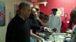 President Barack Obama serves Thanksgiving dinner at a homeless center in Washington, D.C.