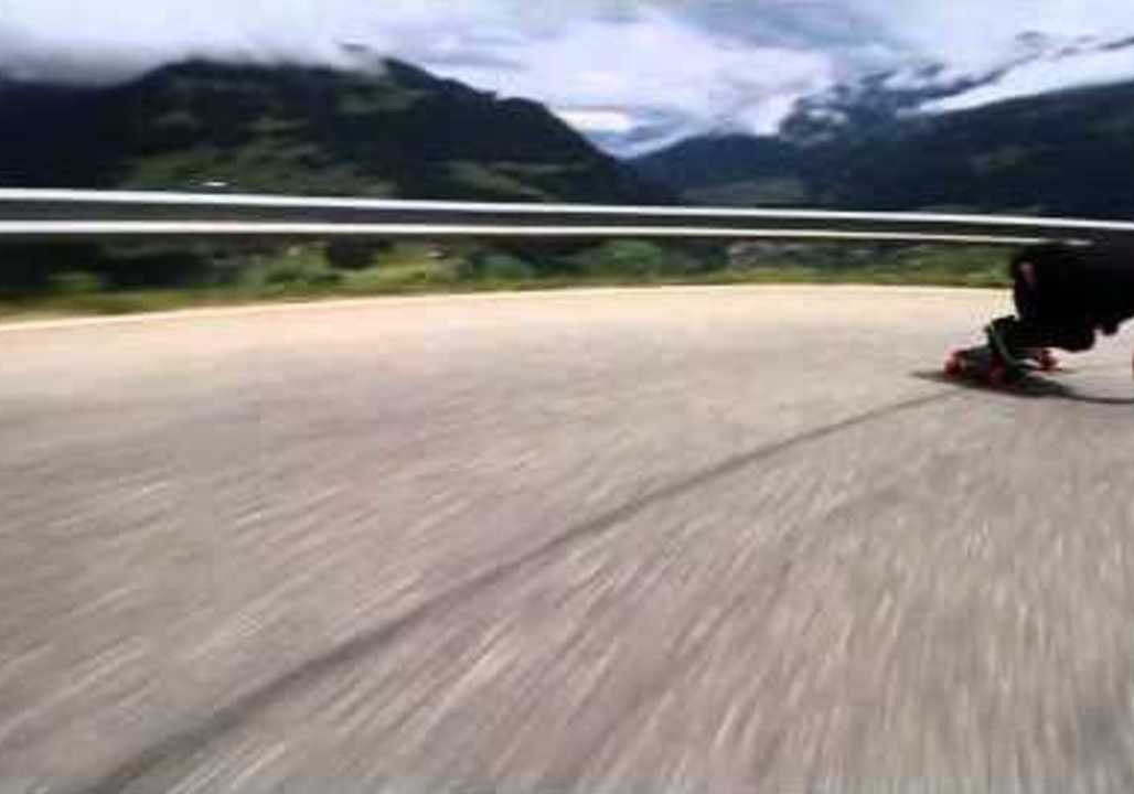 Dizzying Journey Down Swiss Valley on Skateboard