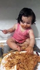 very very cute baby eating