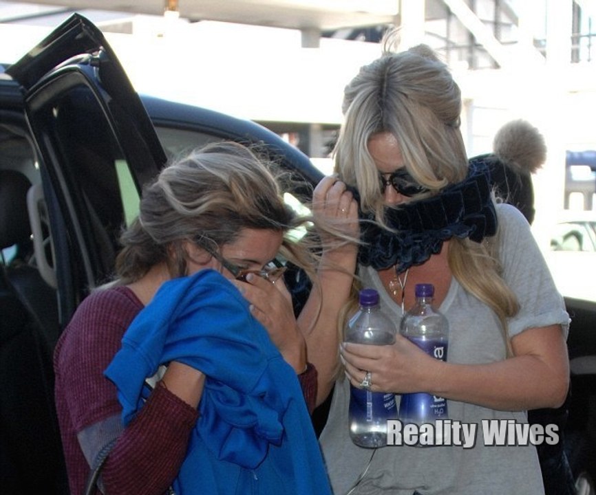 Kim Zolciak Biermann & Brielle Biermann Hide Their Faces At LAX After Lip Injections