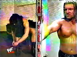WWF-Y2J-confronts-The-Undertaker-and-Big-show-1999