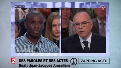 Bernard Cazeneuve interpellé par un jeune homme dans Des paroles et des actes