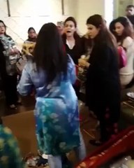 Women Starting Fighting on Dress sale on a local shop