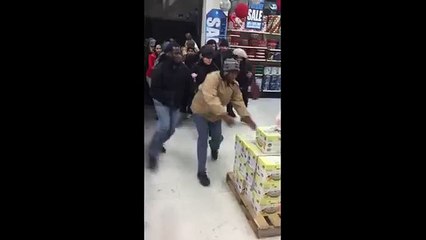 woman snatches a package to a girl In Black Friday