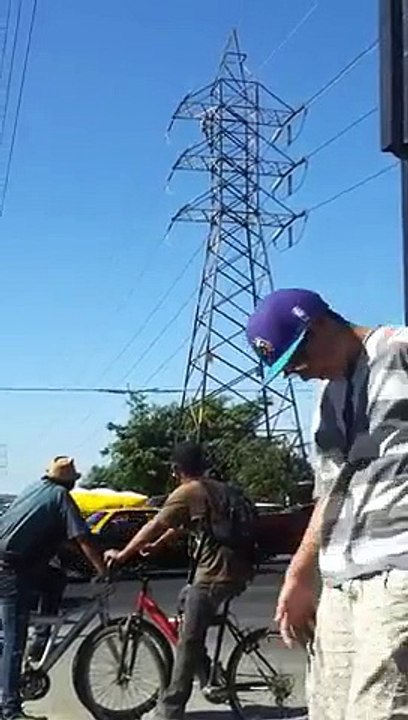 Mad Man on Electrical Pole and Dead