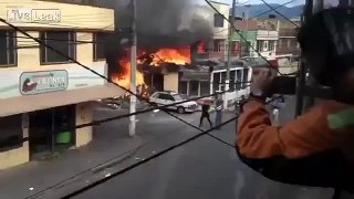 Small plane crash in Bogotas streets aftermath