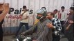 MQM leader Farooq Sattar take to the streets of Karachi on motorbikes