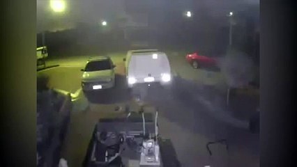 Ghostly apparition caught moving between cars in Perth driveway