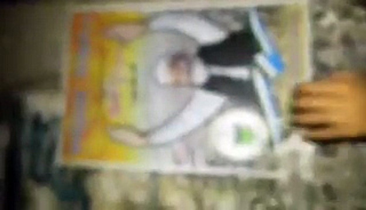 Boy playing with poster