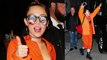 Miley Cyrus Flaunts Her Bra In Inmate Orange Jumpsuit
