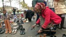 The Pope lends his shoes to Paris climate installation