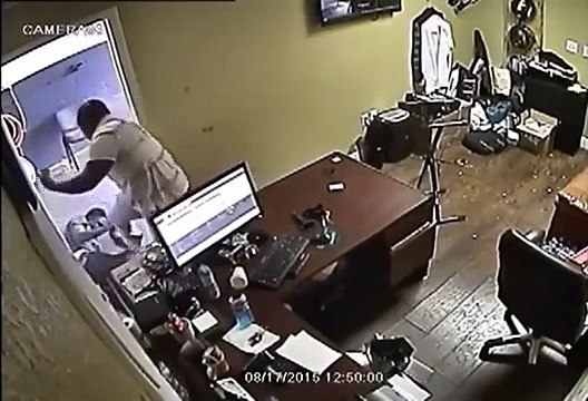 Store Owner Takes Gun From Armed Robbers And Shoots Back
