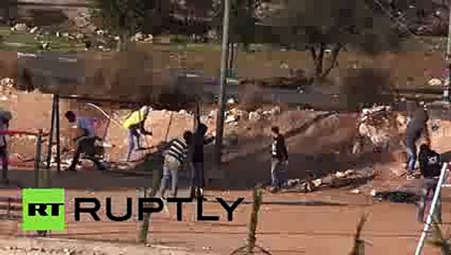 12 injured as Palestinians clash with IDF in Ramallah West Bank 2015