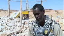 شاب سوداني يخترع آلة لقطع الصخور الصماء وتحويلها إلى حجارة للبناء